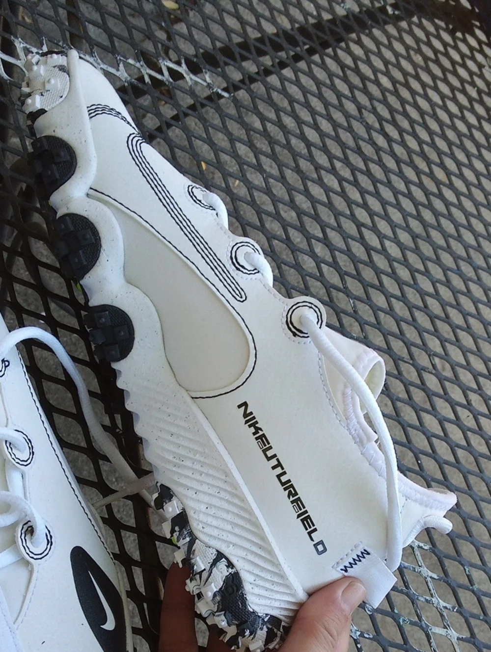 Nike White Sneakers with Black Swoosh Accents